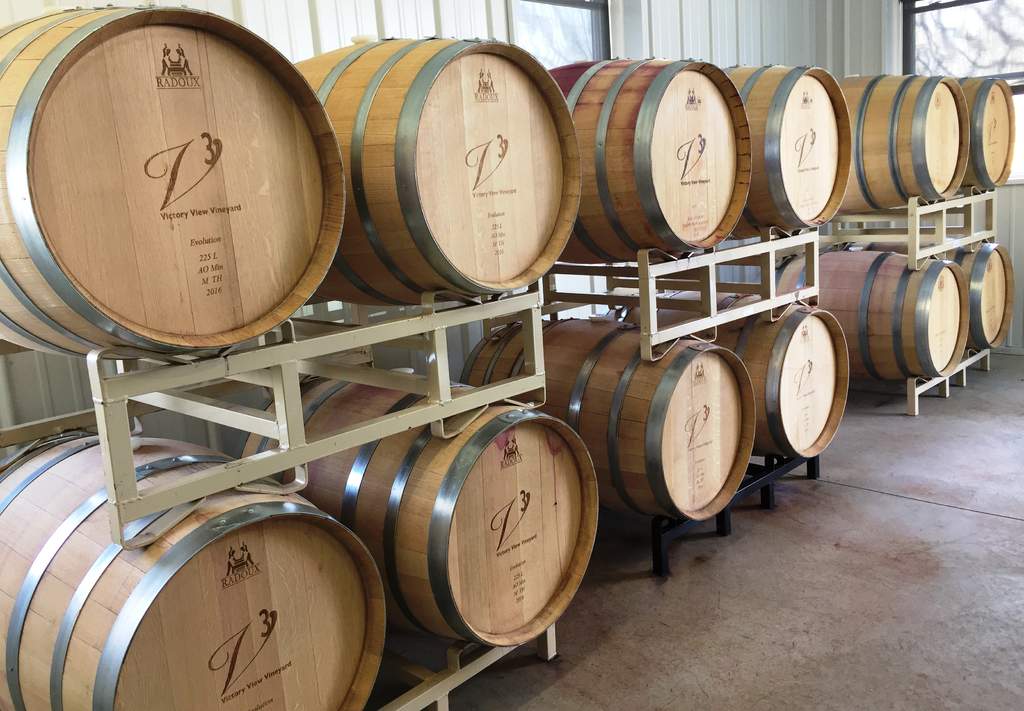 Victory View Vineyard and Farm Winery Oak barrels are racked and stacked in our winery.