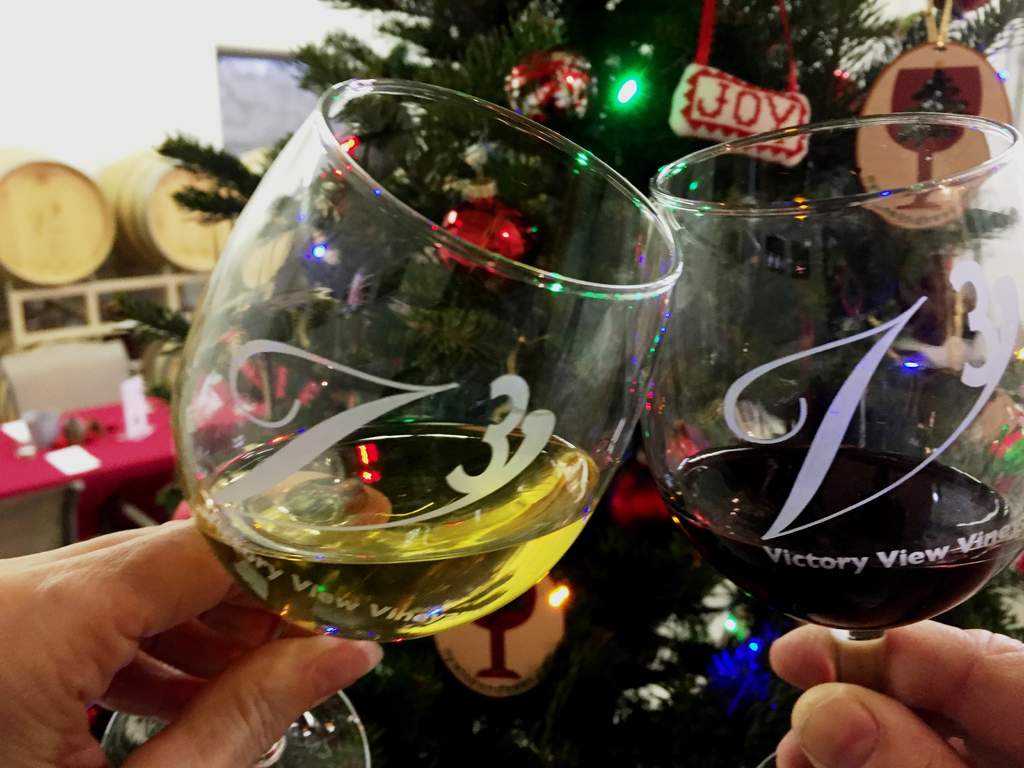 Cheers! Happy New Year! Clinking wine glasses to celebrate the new year