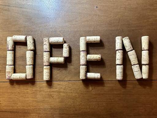 We used wine corks to spell OPEN.